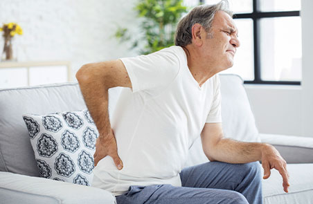 Man suffering from a herniated disc